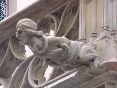 Gargoyle Dude Being Troubled by Snakes